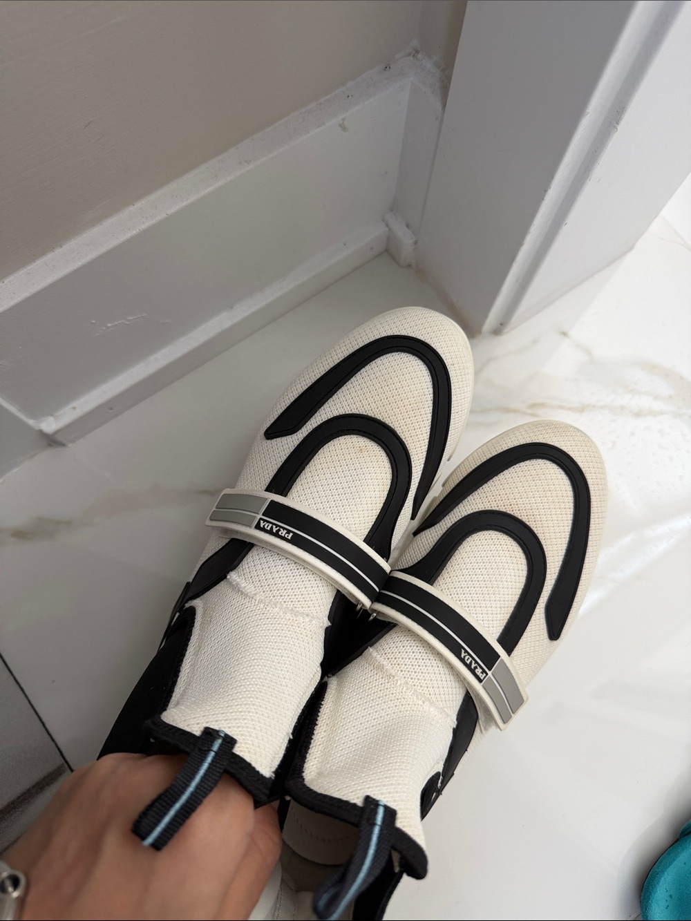 Prada Women's Cream and Black Slip-On Sneakers